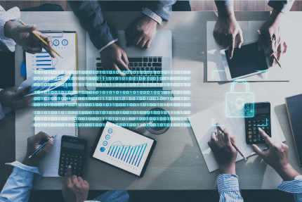 Multiple hands working at a desk